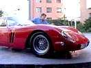 Man waxing his Ferrari