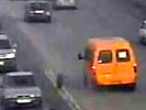 Van loses wheel on the highway.